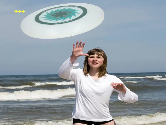 frisbee en la playa